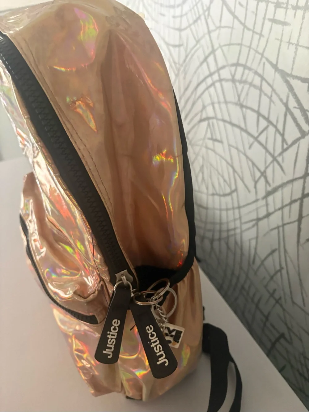 Justice Iridescent Rose Gold Holographic Mini Backpack